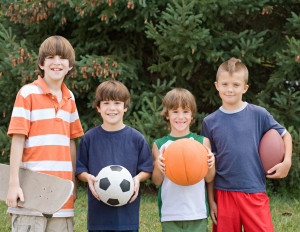Four boys ready for outdoor fun